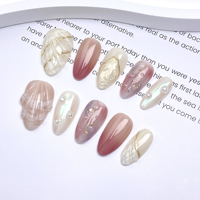 Kit de faux ongles réutilisables de luxe avec accent perle de coquillage, dégradé rose nude, forme amande, pour l'été et la plage