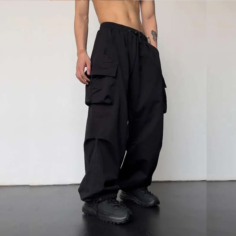 2024 alta qualità Unisex Streetwear personalizzato Anti-rughe Anti-vento tessuto spesso ampio gamba larga pantaloni da paracadute in Nylon per gli uomini
