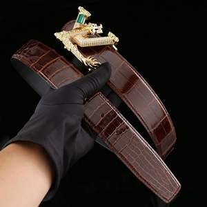 Cinturón de cuero de cocodrilo 100% personalizado por el diseñador con una lujosa hebilla de dragón con incrustaciones de diamantes. - Product Image 3