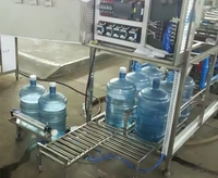 Machine de remplissage d'eau pure électrique automatique 500 ml, haute productivité, moteur à économie d'énergie, PLC pour boissons, Dubaï