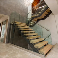 Escalier flottant moderne de Foshan, escalier droit personnalisé avec poutre simple et garde-corps tubulaire pour bureau intérieur