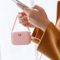 Batterie externe chauffante rapide et élégante en forme de sac à main 5000-10000mAh avec sorties Type-C/USB pour filles