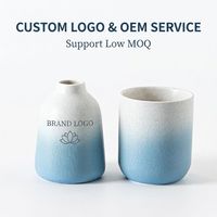 Ensemble de pots à bougies en céramique bleu dégradé de qualité supérieure et de bouteilles d'aromathérapie, vase diffuseur d'arômes en porcelaine mate avec logo personnalisé