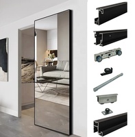 Système de portes coulissantes modernes en bois avec cadre en aluminium, sans rail, à verre simple, pour salon, avec miroir et amortisseur hydraulique