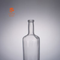 Bouteille de liqueur en verre transparent cylindrique de 700 ml, bouteille en verre à fond épais irrégulier pour la vodka, le gin, les spiritueux, vente en gros