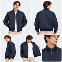 Blouson Bomber Homme Col Montant Bleu Marine avec Fermeture Éclair et Boutons-Pression, Doublure Matelassée Légèrement Rembourrée, Poignets et Ourlet Côtelés, Manteau Décontracté d'Hiver – Vente en Gros