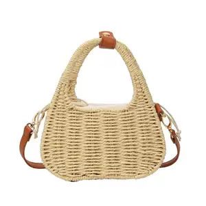 2024 vente chaude version coréenne de sac à bandoulière à la mode tissé d'herbe à bandoulière, sac portable pour femmes de plage de style vacances