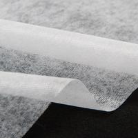 Entoilage thermo-tissé de fusion de microdot de lien de tissu non tissé d'adhésif de polyester pour des jeans et le denim