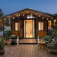 Maison conteneur pliable robuste à double aile avec design contemporain, cabine modulaire résistante aux intempéries pour usage extérieur