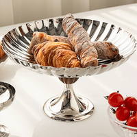 Europese stijl licht-luxe roestvrijstalen fruitplateau op voet, solide patroon, woonkamer snack- en drankenopbergbak