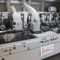 Machine à raboter le bois à quatre faces pour la production et le traitement de planches et de moulures en bois
