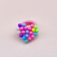 En gros : Accessoires de cheveux faits main : Élastiques à cheveux en perles, papillons, cordes à cheveux en forme de cœur, élastiques à cheveux en forme d'étoiles avec strass