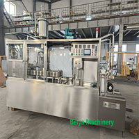 Machine d'emballage électrique entièrement automatique pour le remplissage, le bouchage et la scellure de poudres de boissons en carton (type Gable Top) 250ml 500ml 1000ml