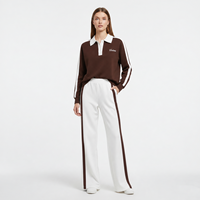 Ensemble de survêtement pour femme à manches courtes, veste courte zippée, pantalon de survêtement à jambes larges avec rayures latérales et boutons-pression, vente en gros