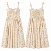 Robe midi rose à fleurs pour femme, corsage structuré, sans manches, jupe fluide fendue sur le côté, fournisseur de marque privée pour boutiques de villégiature