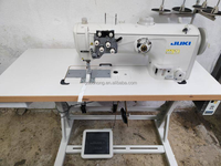 JUKIS LU-2860 2 aiguilles à alimentation synchrone pied-de-biche semi-sec à entraînement direct machine à coudre industrielle à point noué avec table de travail