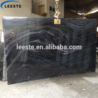 Marbre noir serpeggiante veines de bois noir dalles polies en marbre carreaux de mur dessus de vanité