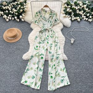 Combinaison décontractée imprimée à col revers et manches courtes, taille nouée, jambe large, style vacances pour femme - Tendance - Product Image 6