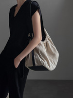Sac de voyage léger en toile grande capacité avec cordon de serrage, style tendance urbaine pour porté en bandoulière