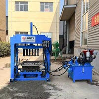Machine automatique hydraulique LONTA QTJ4-35A pour la fabrication de blocs de pavés creux autobloquants en ciment et béton, briqueterie