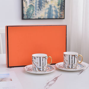 Vente en gros de tasses et d'assiettes en porcelaine fine de luxe européenne à motif de cheval orange et blanc - Product Image 1
