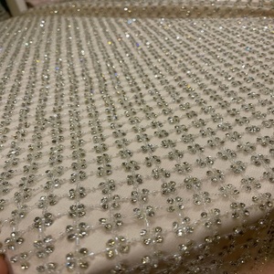 ผ้าปักลายลูกปัดดีไซน์เนอร์ พร้อมรายละเอียดดอกไม้คริสตัล วัสดุลูกไม้พรีเมียม สำหรับชุดแต่งงาน ชุดราตรี และงานสิ่งทอ - Product Image 1