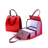 Boîte cadeau de luxe pliable en cuir texturé de style sac à main rouge personnalisée Dr. Box avec boucle métallique et poignée pour vin