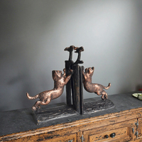 MEGBOND Serre-livres en fonte de style européen, figurine artisanale en métal pour la décoration intérieure, représentant un oiseau en train de tenter de saisir un oiseau, objet de collection artistique