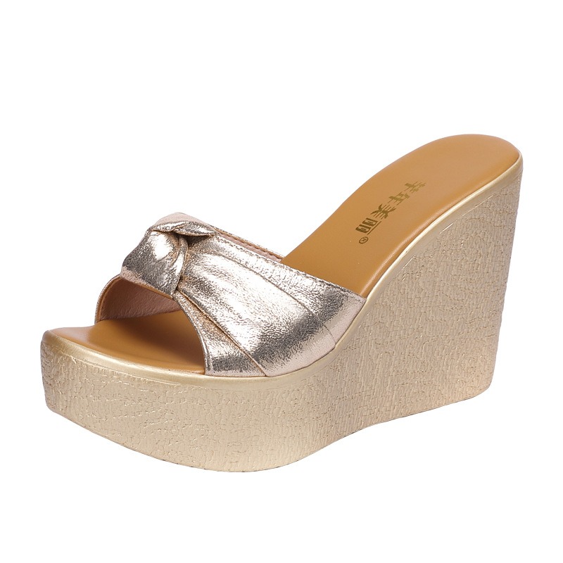 golden color wedges slippers