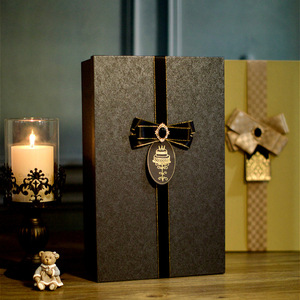 High-end black gift box custom logo special paper hot stamping ribbon gift boxes heart designs packaging for Christmas