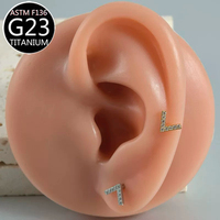 Anting-anting titanium zircon, anting-anting tulang telinga, anting-anting titanium flat back, perhiasan tindik tubuh, anting-anting bibir, anting-anting lidah.