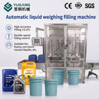 Machine de remplissage automatique de barils et de jerricans de 20 kg pour liquides chimiques corrosifs et liquides moussants de 3, 5 et 10 gallons