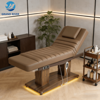 Lit de massage électrique de luxe moderne avec base en bois, 4 moteurs, inclinable et réglable en hauteur, pour soins du visage, salon de beauté et extensions de cils