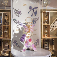 Porte-clés en résine et alliage léger, réutilisable, à la mode, avec fleurs séchées papillon et marguerite faites à la main, pour femmes, vente en gros