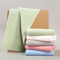 Serviettes de toilette douces multicolores en coton gaufré léger, personnalisables, pour hôtels, spas et chambres d'hôtes (vente en gros)