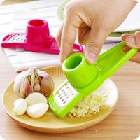 Dropshipping Europe Accessoires de cuisine en plastique Eplucheur en silicone magique Trancheuse Râpe à gingembre Outil de broyage d'ail