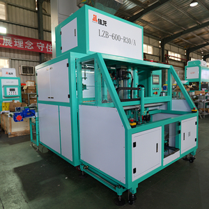 เครื่องบรรจุภัณฑ์สุญญากาศแบบอัตโนมัติสำหรับเต้าหู้สำหรับแมว น้ำหนัก 1 กก. 2.5 กก. 5 กก. รูปทรงก้อนหกเหลี่ยม พร้อมระบบชั่งน้ำหนักและปิดผนึก - Product Image 2