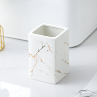 Ensemble de salle de bain élégant en céramique marbrée blanche Accessoires de salle de bain de luxe 4 pièces pour la maison, l'hôtel, le bureau, l'appartement et la décoration moderne