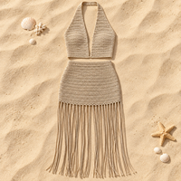 Ensemble deux pièces en polyester tricoté effet crochet pour femme, avec haut dos nu et bas taille haute à franges longues, idéal pour les vacances