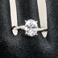 Bijoux fins à la mode plaqué rhodium rationaliser S925 argent ovale tricot torsion Moissanite anneaux de mariage ensemble pour Couple fiançailles
