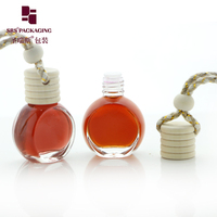 Diffuseur de voiture vide à suspendre, mini désodorisant, flacon en verre pour huiles essentielles et parfums, avec bouchon en bois noir à ouverture facile, forme ronde