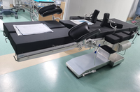 Mesa Quirúrgica con Base de Acero Inoxidable 304, Superficie de Fibra de Carbono, Ajuste Neumático de Patas y Función de Reinicio con una Sola Tecla