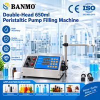 Machine de remplissage de liquides à double tête BANMO pour cosmétiques, huiles essentielles, boissons, produits chimiques et solvants