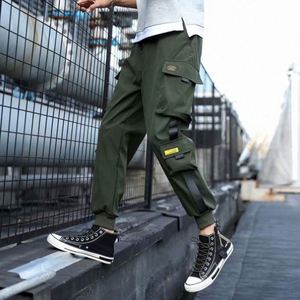 Wholesale Men <b>Tape</b> Loose <b>Binding</b> Pants Casual Trousers Punching Pants Patchwork Loose Cargo Pants Fashion Style - Product Image 6