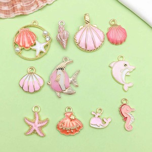 ชุดจี้โลหะผสมธีมมหาสมุทรสีชมพู ชุดเครื่องประดับ DIY สำหรับฤดูร้อน ลายสัตว์ทะเล สำหรับทำสร้อยข้อมือและเครื่องประดับ - Product Image 1