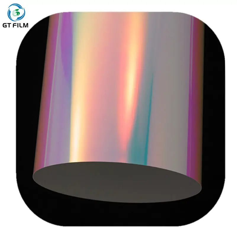 Film magique arc-en-ciel PET transparent résistant à l'usure Taiwan laser doré film de couleur vive rouleau de tension variable à sept couleurs