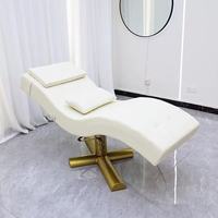 Table de massage et de soin esthétique moderne, pliable et réglable, en acier inoxydable, pour salon de beauté, spa, hôtel et chambre, personnalisable en usine