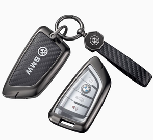 <span class=keywords><strong>BMW</strong></span>メタルカーボンファイバーカーキーFOBカバーケースシェルプロテクター新しいデザイン最新高級ユニセックスキーチェーンストラップ付き