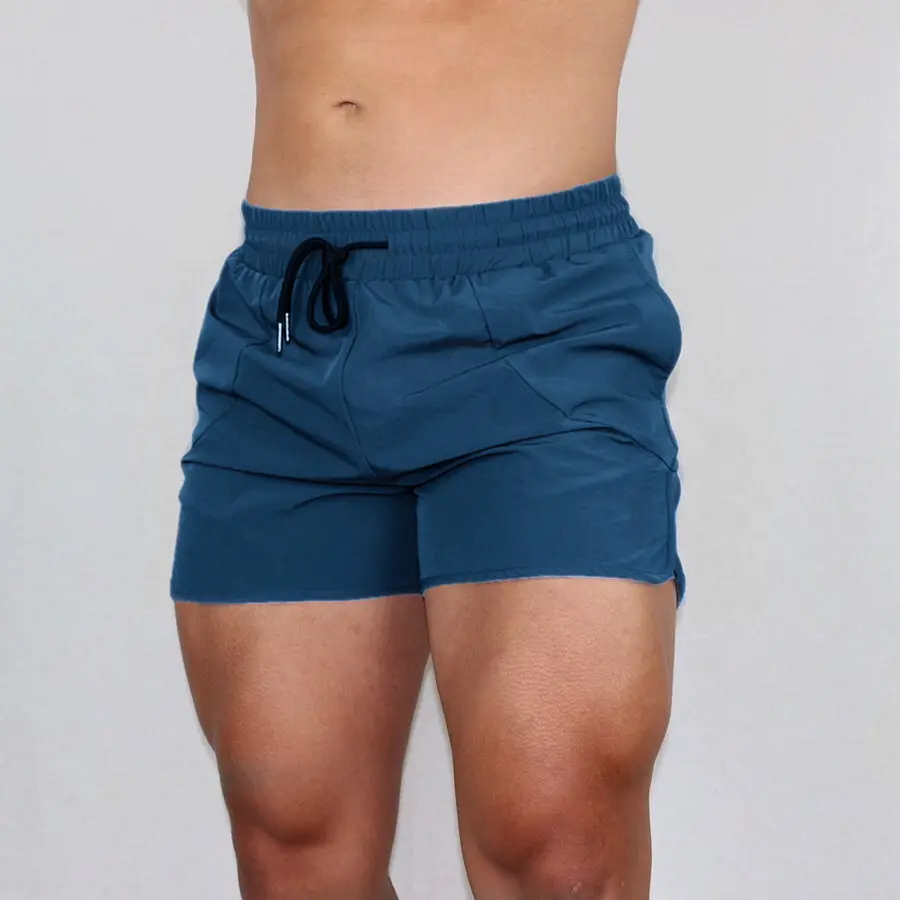 Calça esportiva masculina de secagem rápida, calça casual atlética de verão de treino de três quartos para homens, shorts curtos elásticos respiráveis para academia