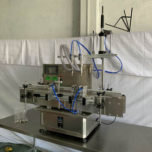 เครื่องบรรจุของเหลวแบบตั้งโต๊ะอัตโนมัติเต็มรูปแบบ หัวบรรจุคู่ ระบบนิวเมติก 220 โวลต์ พร้อมมอเตอร์ปั๊ม PLC - Product Image 1